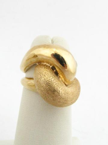 Appraisal: K yellow gold lady's ring weighing dwt with interlocking twist