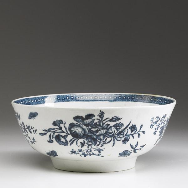 Appraisal: WORCESTER Dr Wall blue and white punchbowl with floral decoration