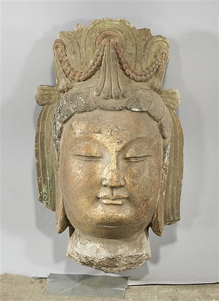 Appraisal: Chinese parcel-gilt carved stone Buddha head x x approx Condition