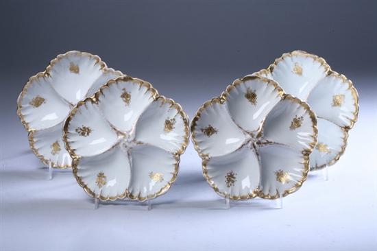 Appraisal: TWELVE LIMOGES PORCELAIN OYSTER PLATES late th century Each with