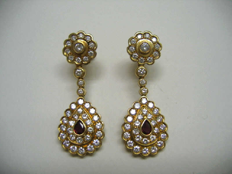 Appraisal: DIAMOND AND RUBY EARRINGS Pair of k yellow gold ear