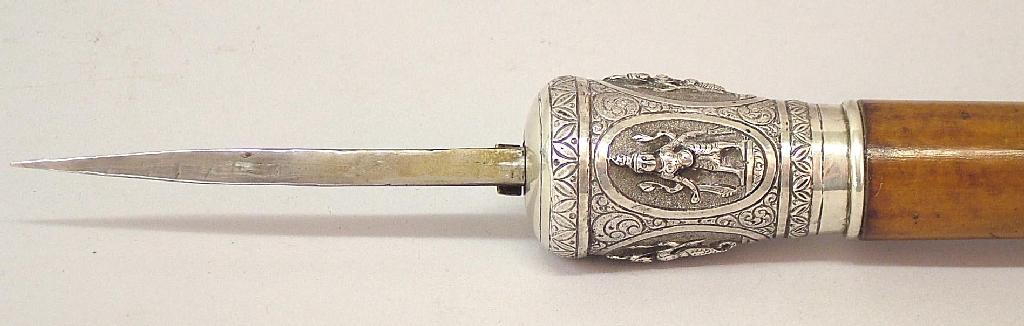 Appraisal: Malacca swordstick with floral embossed white metal knop