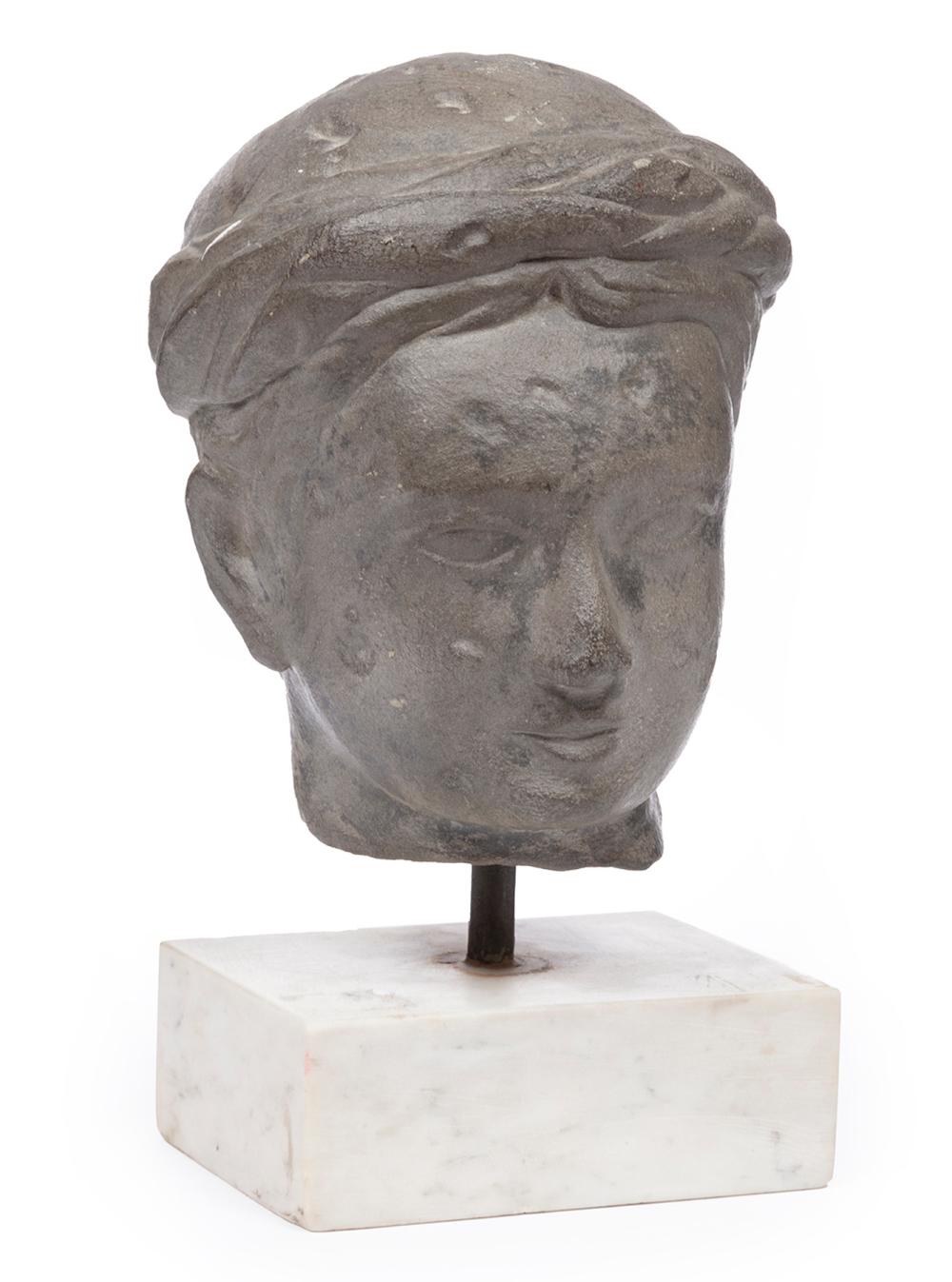 Appraisal: CARVED STONE HEAD OF A TURBANNED YOUTHCarved Stone Head of