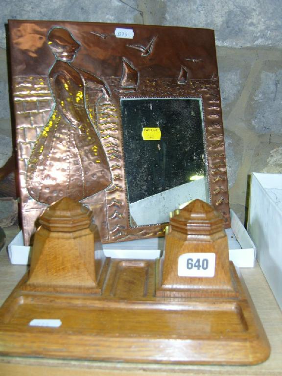 Appraisal: A carved oak desk stand comprising a pair of inkwells