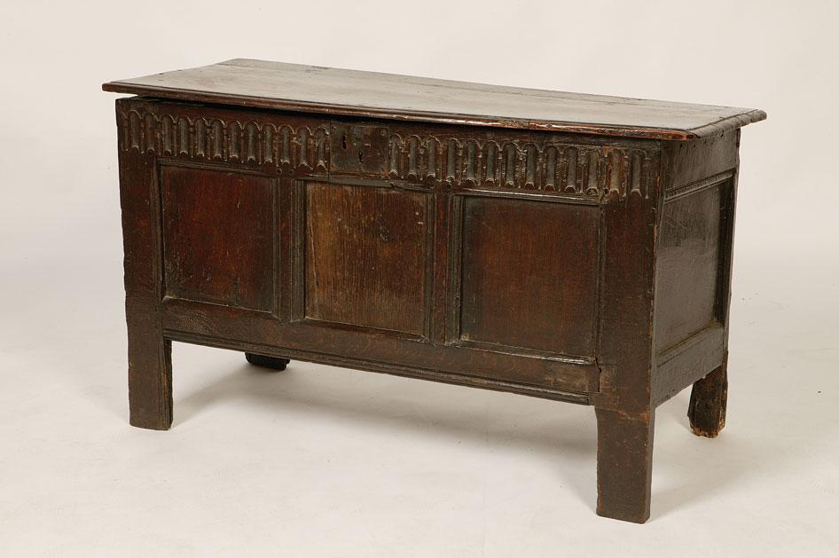 Appraisal: A CHARLES II OAK COFFER the rectangular top with a