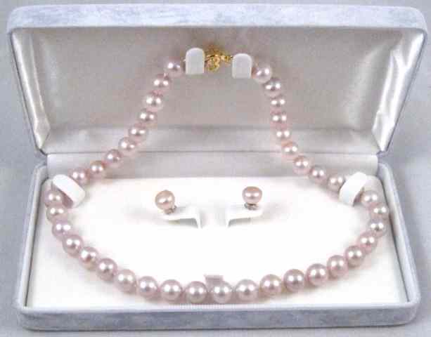 Appraisal: THREE ARTICLES OF PINK PEARL JEWELRY including a pair of