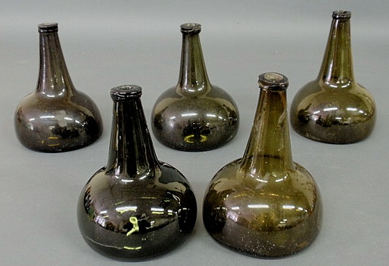 Appraisal: Group of five Dutch green glass onion wine bottles th