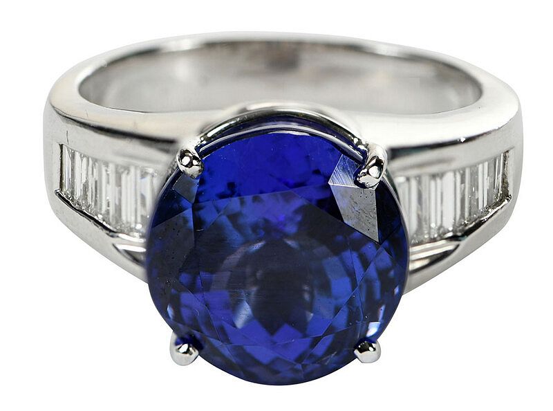 Appraisal: Platinum Tanzanite and Diamond Ring center round fancy cut tanzanite