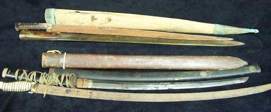 Appraisal: A Japanese sword in a lacquered sheath a machete by