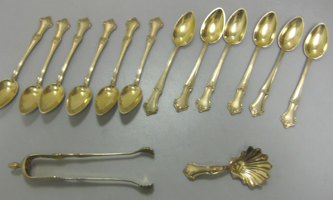 Appraisal: FRENCH VERMEIL SILVER DESSERT SERVICE Comprising sugar tongs shell form