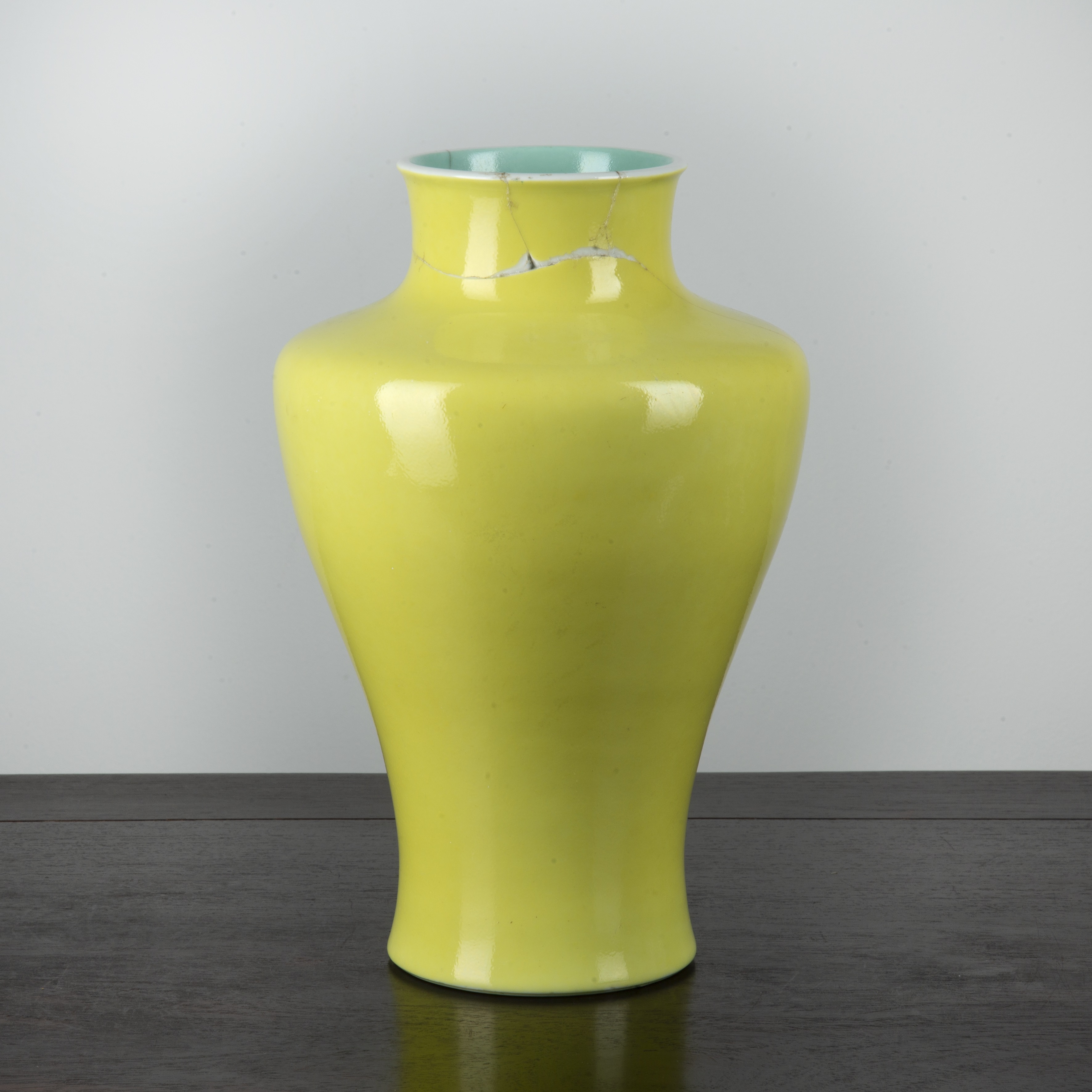 Appraisal: Yellow ground vaseChinese th Century of tapering form and with