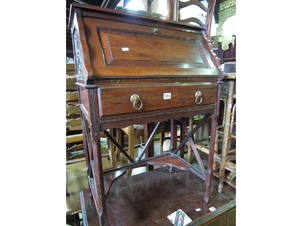 Appraisal: An unusual Edwardian mahogany bureau the panelled fall front enclosing