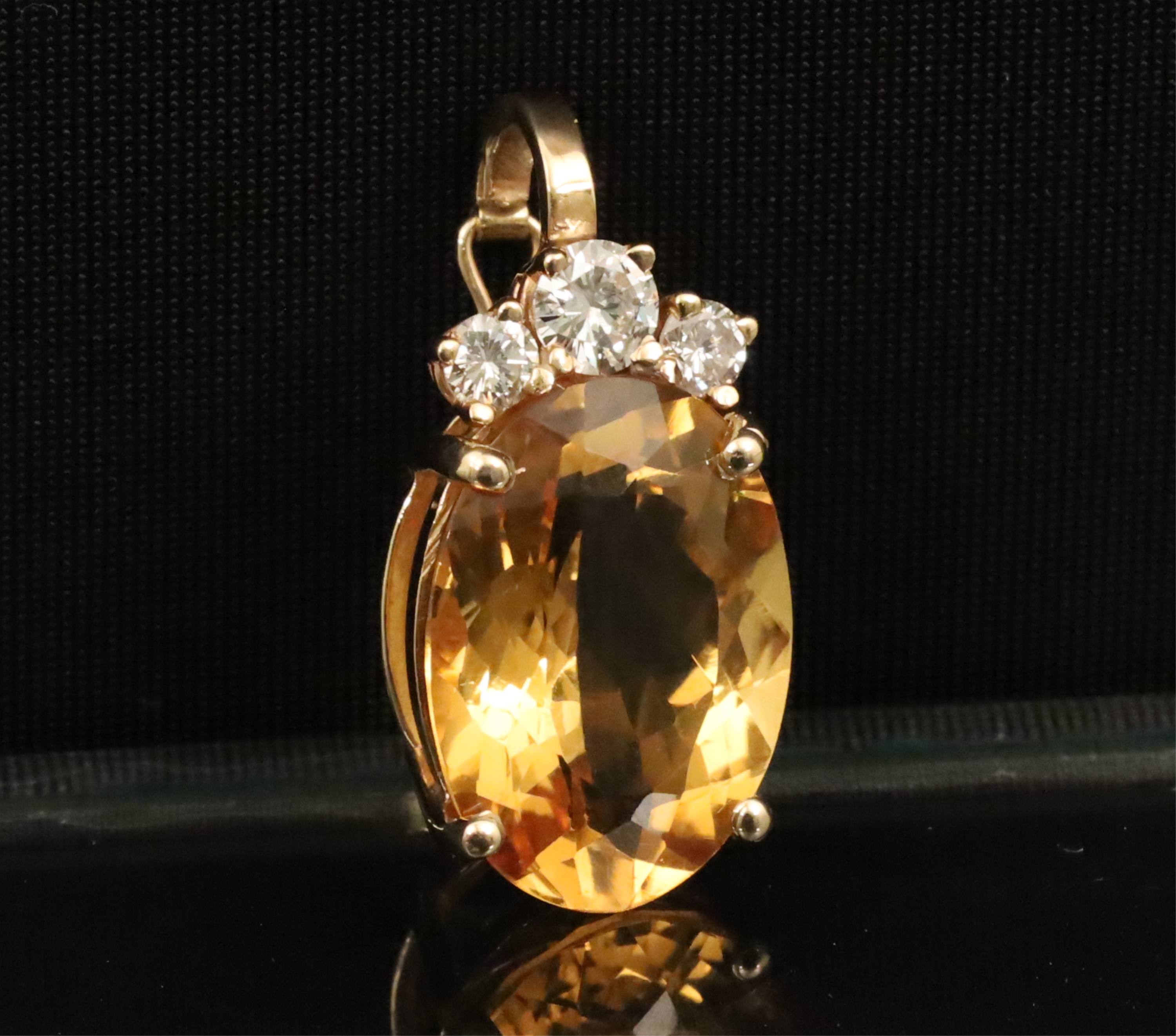 Appraisal: K YG CITRINE AND DIAMOND PENDANT K yellow gold citrine