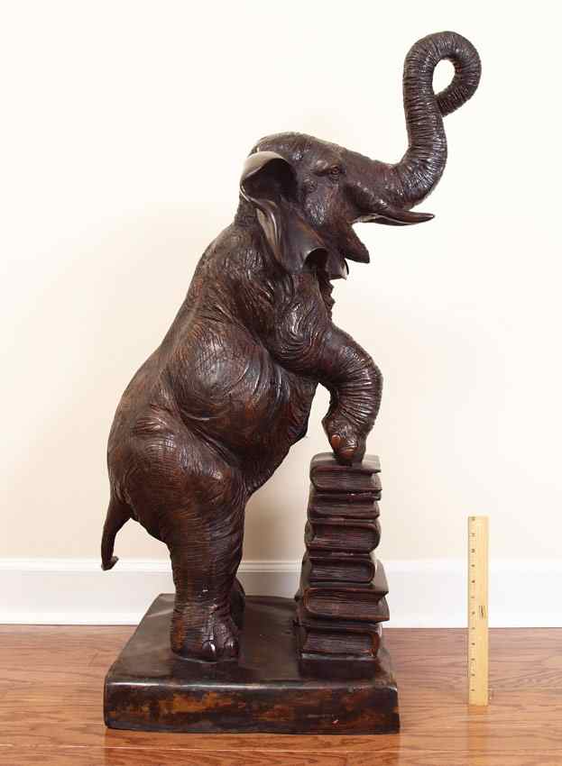 Appraisal: LARGE DECORATIVE BRONZE ELEPHANT ON BOOKS Model of an elephant