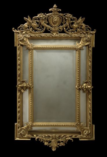 Appraisal: French Carved Giltwood and Mirrored Glass Looking Glass third quarter