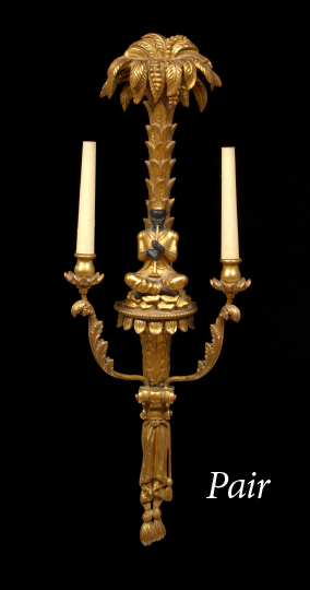 Appraisal: Pair of Venetian-Style Ebonized and Carved Giltwood Blackamoor Two-Light Appliques