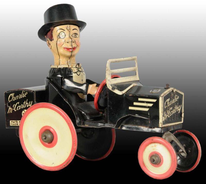 Appraisal: Marx Tin Wind-Up Charlie McCarthy Toy Car Description Working Original