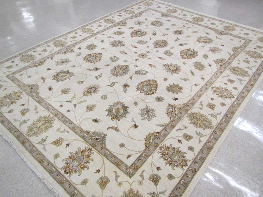 Appraisal: HAND KNOTTED ORIENTAL CARPET Indo-Persian overall scrolling floral raceme decoration