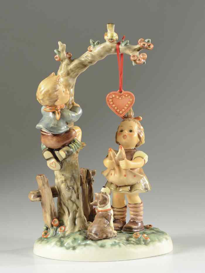 Appraisal: GERMAN HUMMEL PORCELAIN FIGURAL GROUP ''Here's My Heart '' HUM