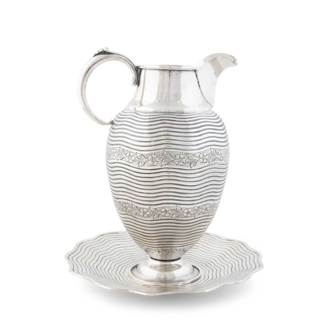 Appraisal: PC TURKISH SILVER FLORAL PITCHER UNDERPLATE Turkish Mid-Century Modern silver