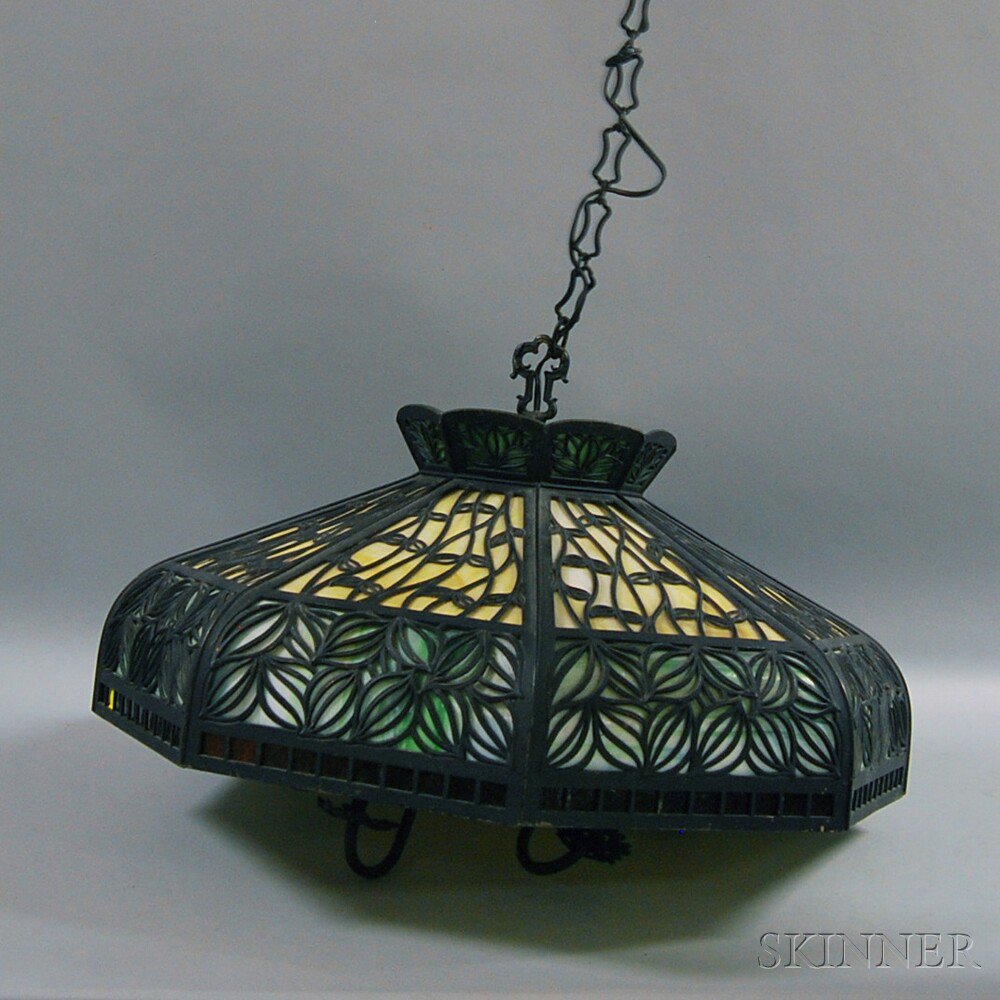 Appraisal: Metal Overlay Slag Glass Hanging Lamp th century eight-sided shade