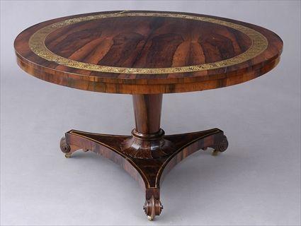 Appraisal: REGENCY BRASS-INLAID ROSEWOOD CENTER TABLE The tilt top with anthemia