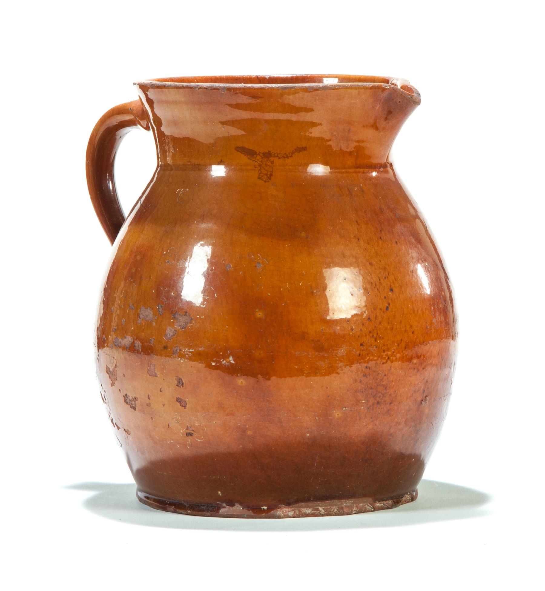 Appraisal: AMERICAN REDWARE PITCHER First half- th century Large pitcher with