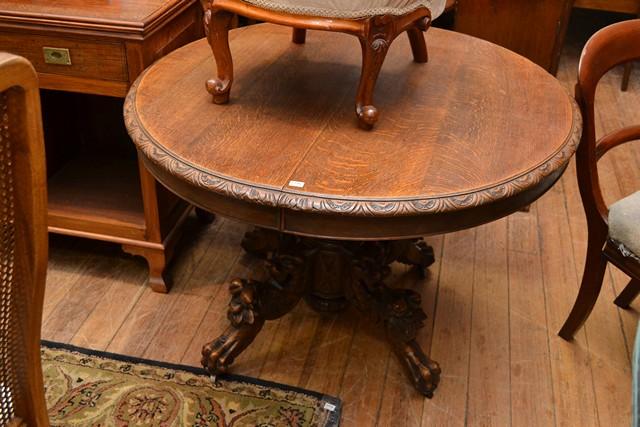 Appraisal: A VICTORIAN OAK CENTER TABLE ON CARVED BASE