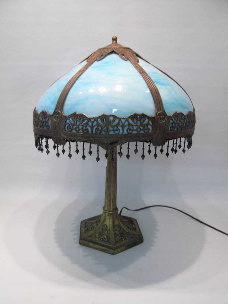 Appraisal: SLAG GLASS SHADED TABLE LAMP the shade having six blue