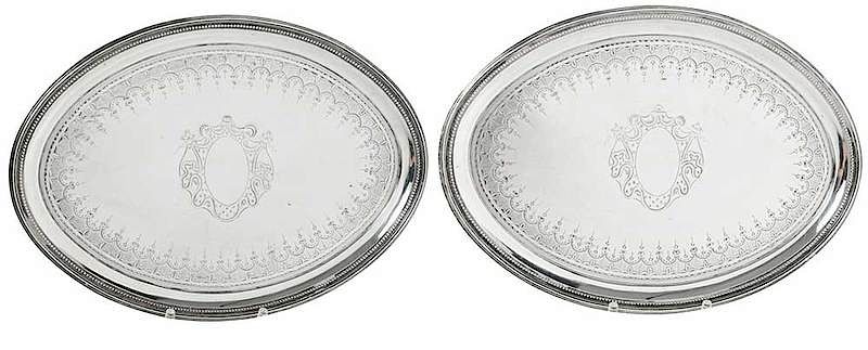 Appraisal: Pair of English Silver Trays London oval with bead border