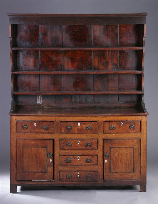 Appraisal: WELSH OAK CUPBOARD th century upper and lower sections associated