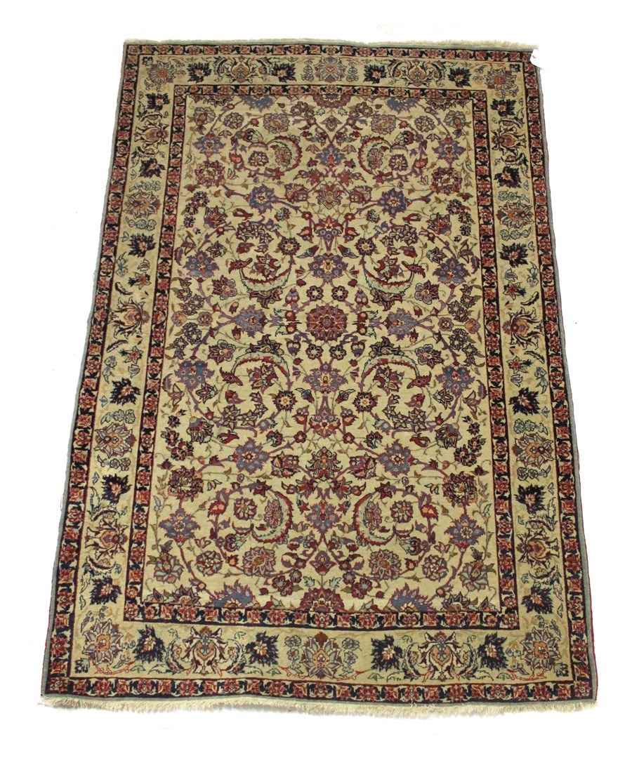 Appraisal: A Kerman rug Persian the ivory field with an allover