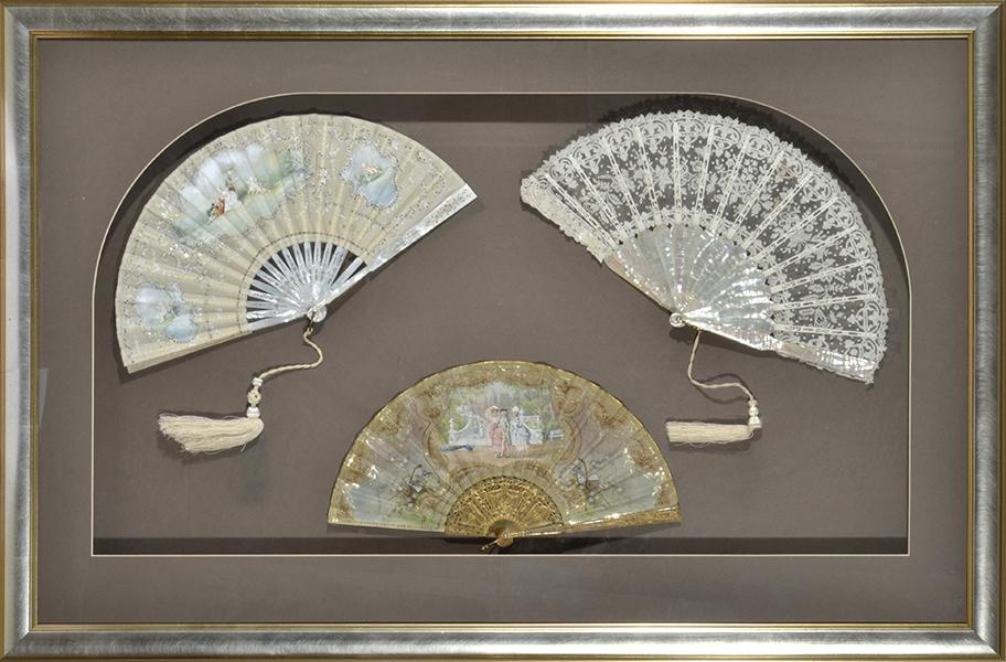 Appraisal: THREE CASED FANS two with hand painted courting scenes and