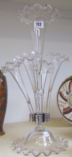 Appraisal: A clear glass five branch epergne with frilled rim cm