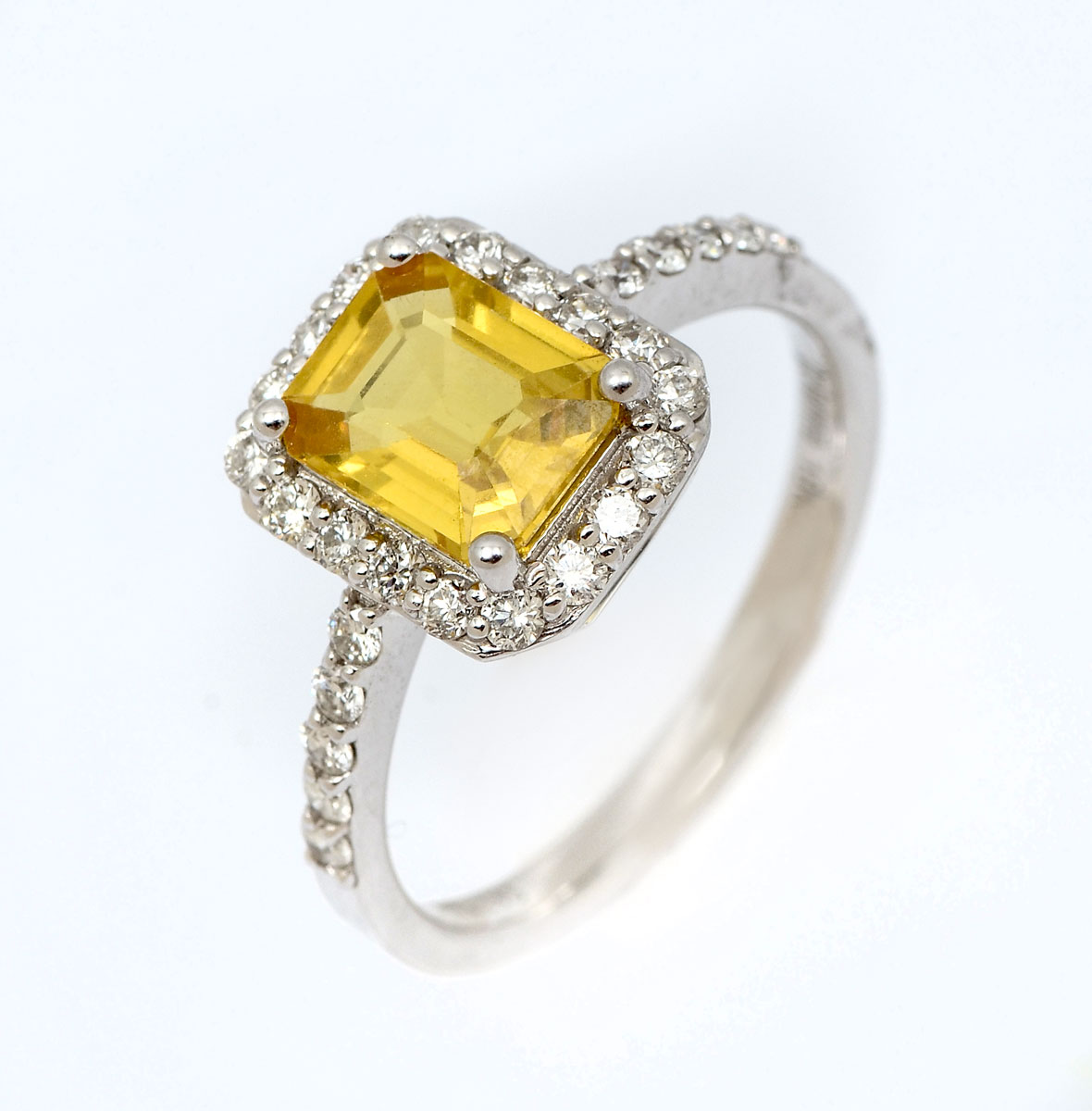 Appraisal: K YELLOW SAPPHIRE RING Rectangular step cut natural yellow sapphire