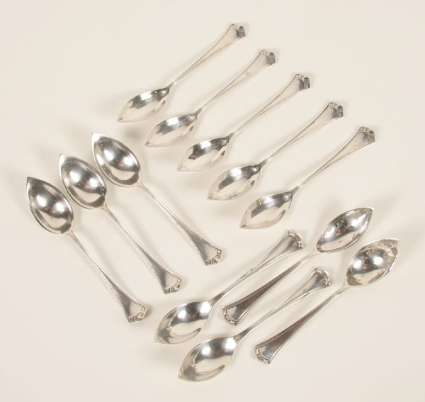 Appraisal: Twelve Baker-Manchester sterling grapefruit spoons Two spoons in the Roanoke