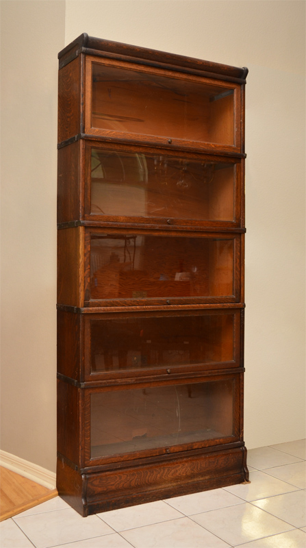 Appraisal: GLOBE WERNICKE OAK LAWYERS BOOKCASE Five section stacking bookcase plus