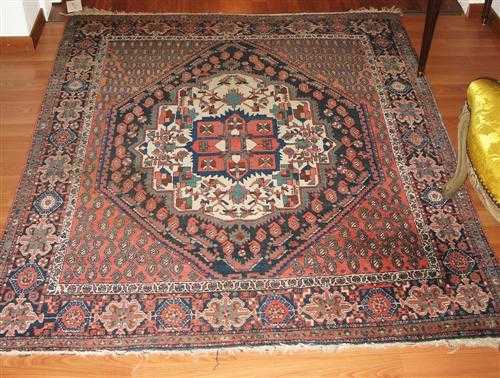 Appraisal: AFSHAR old White central medallion on a rust coloured ground