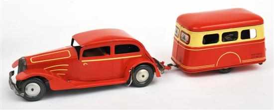 Appraisal: Joustra Clockwork Tinplate Car And Caravan French including orange car