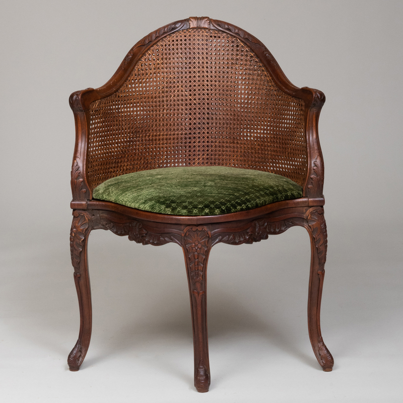 Appraisal: EARLY LOUIS XV STYLE CARVED BEECHWOOD AND CANED FAUTEUIL DE