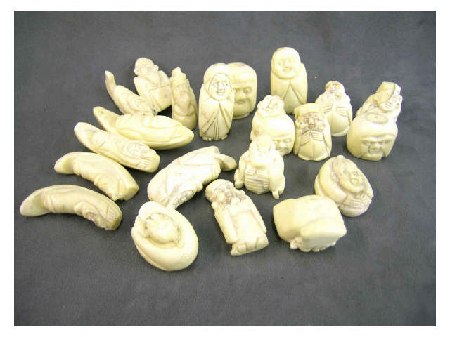 Appraisal: Group of twenty-one bone netsuke of various deities Contemporary some