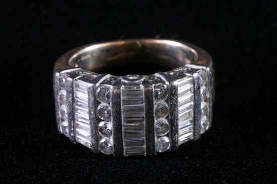 Appraisal: K YELLOW AND WHITE GOLD AND DIAMOND BAND Four rows