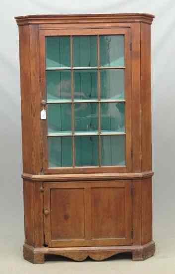 Appraisal: th c pine New England corner cupboard Top has single