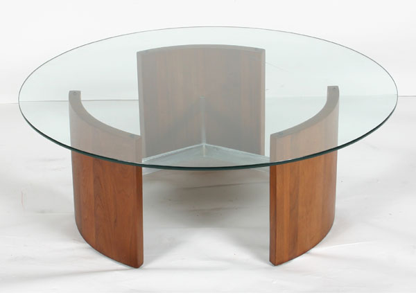 Appraisal: Modern coffee table with wood and metal base and glass