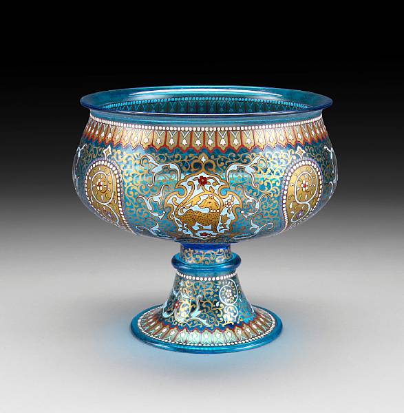 Appraisal: A Brocard style Persian inspired enameled blue tinted glass footed