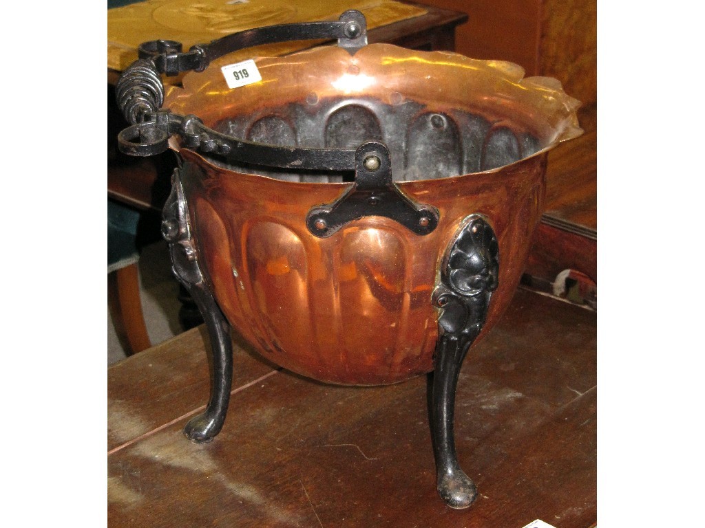 Appraisal: Copper and cast metal scuttle