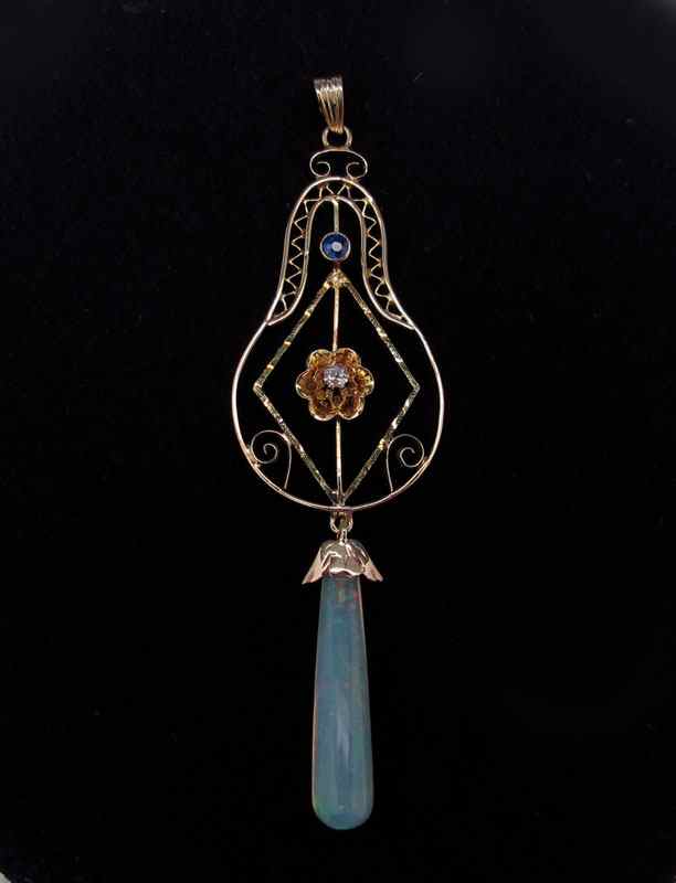 Appraisal: K GOLD DIAMOND SAPPHIRE AND OPAL DROP PENDANT Delicate gold