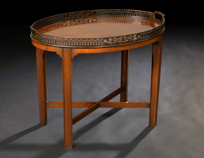 Appraisal: Edwardian Mahogany Tray Table ca and later the oval tray