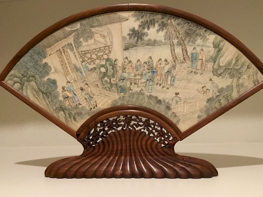 Appraisal: Chinese Painted Fan on Rosewood Stand Painted fan of noblemen