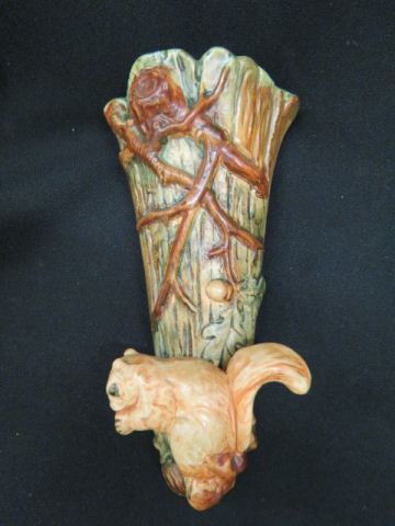 Appraisal: Weller Pottery Woodcraft Wall Pocketwith figural squirrel excellent